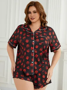 Plus size black pajama set for women featuring red gift box print and white piping detail.