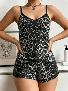 Sexy women's leopard print two-piece pajama set with a V-neck camisole and matching shorts
