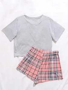 Casual women's lounge set featuring a grey short-sleeve top and pink plaid shorts