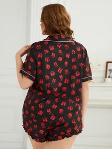 Plus size black pajamas set with red gift box print and white piping, back view detail.