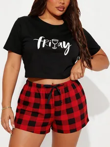 Women's casual pajama set with black 'Friday' graphic top and red buffalo plaid shorts