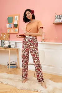 Women's summer pajama set with orange short-sleeve top and floral pattern pants