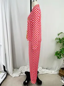 Professional side view of red and pink striped long sleeve pajama set on a mannequin