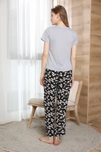 Back view of ladies grey short-sleeved T-shirt and floral print pajama pants set