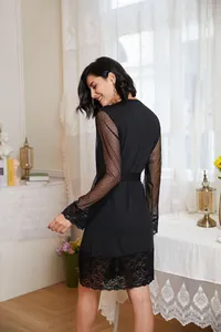 Back view of elegant black mesh long sleeve robe with delicate lace trim detail.