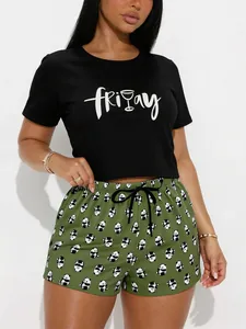 Detail of women's black Friday t-shirt and green panda print pajama shorts set