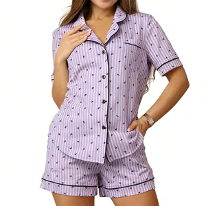 Women's two-piece striped pajama set featuring short-sleeved shirt and shorts in purple
