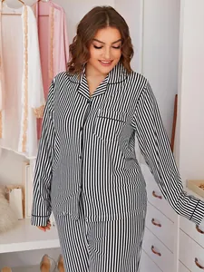 Plus size women's black and white striped long-sleeve pajama set for comfortable home wear.
