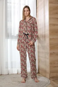 Leopard print women's pajama set featuring long-sleeve button-down top and matching pants