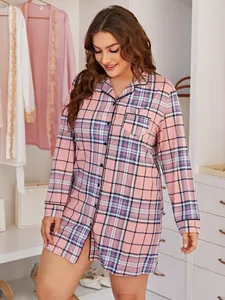 Detail view of a plus-size pink plaid long-sleeve button-down nightshirt