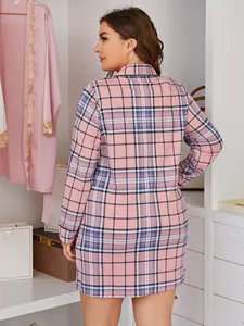 Back view of a plus-size pink plaid long-sleeved nightgown shirt dress for women