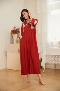 Full view of red vintage palace style nightgown with elegant white lace details