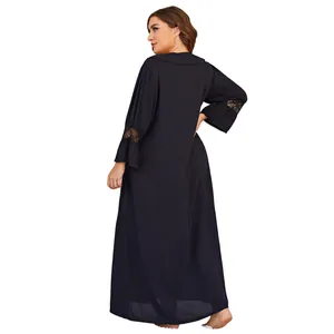 Detailed back view of a plus size long-sleeved black nightdress with floral lace trim