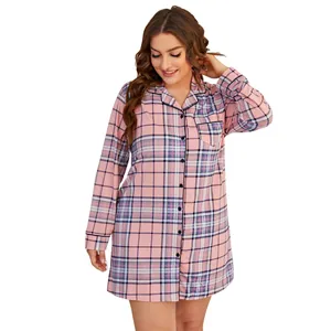 Detailed view of women's pink plaid long sleeve nightshirt with button-down front