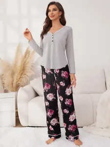 Full view of women's floral loungewear set in a cozy white living room background