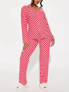 Fashionable red and pink diagonal stripe long-sleeve pajama set for women, cozy sleepwear.