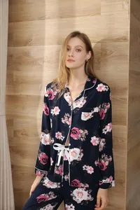 Long-sleeved floral pajama set for women featuring elegant rose print and lapel collar