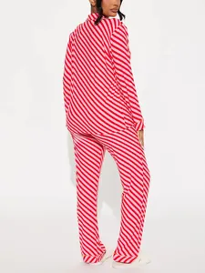 Back view of women's red and pink diagonal striped long-sleeve Christmas pajama set