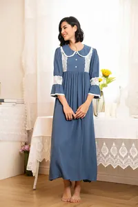Elegant women's long sleeve palace style nightgown featuring delicate lace detailing