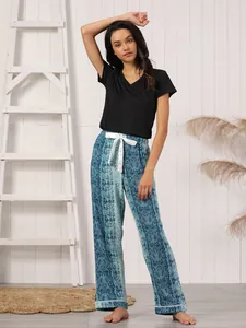 Casual women's pajamas set with black V-neck top and blue snakeskin print lounge pants