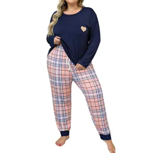 Plus size women's navy long sleeve heart print pajama set with plaid pajama pants