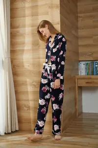 Floral print two-piece pajama set with long sleeves and pants in navy blue