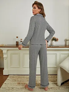 Back view of women's checkered pajama set with long-sleeve top and trousers in soft fabric