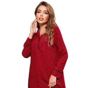 Detailed view of women's classic red and black plaid long-sleeved Christmas nightgown dress