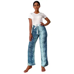 Casual women's two-piece pajama set with white short-sleeve top and blue patterned pants