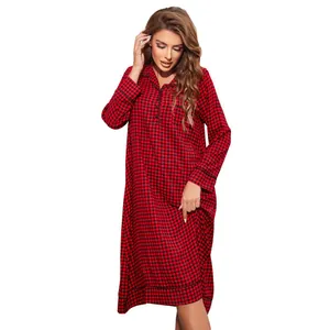 Detail view of a long red plaid nightgown with long sleeves and a buttoned collar