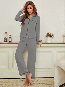 Full body view showcasing the striped texture and relaxed fit of the women's loungewear set