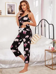 Detailed full-body view of floral pajama set featuring camisole and cropped pants