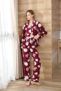 Full-body view of burgundy floral long-sleeve pajama set for women