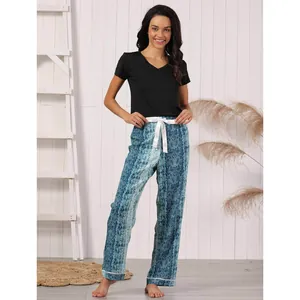 Women's two-piece casual pajama set with black V-neck top and blue patterned pants