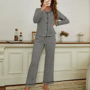 Women's black and white diamond pattern pajama set featuring a long sleeve top and long pants.
