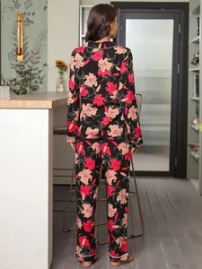 Back view of a long-sleeved floral pajama set for women shown in a cozy home setting