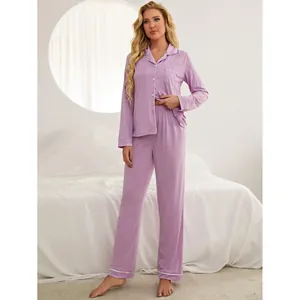 Women's classic purple long-sleeve pajama set with white piping and button-up shirt