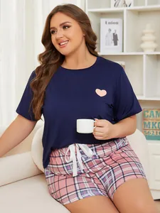 Plus size two-piece pajama set with heart print top and plaid shorts for loungewear