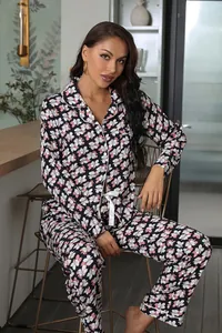 Women's floral print pajama set with button-down long sleeves and matching pants