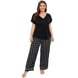 Women's plus-size pajama set with black short-sleeve V-neck top and plaid long pants