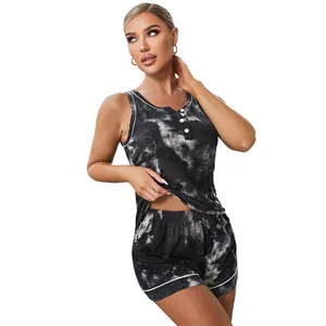 Detail of women's black tie-dye pajama set featuring sleeveless tank top and shorts.