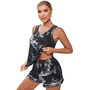 Close-up showing the fit of a women's black and white tie-dye sleeveless pajama set