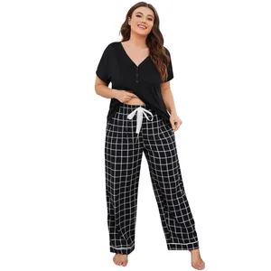 Plus size women's summer pajamas set with black V-neck short sleeve top and checkered pants.