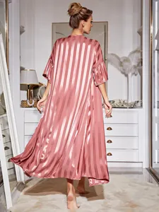 Back view of elegant pink striped silk robe set featuring luxury flowing satin texture