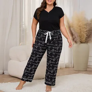 Plus size women's pajama set with short sleeve top and heart pattern long pants