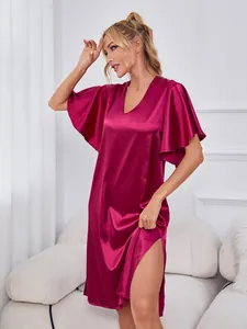 Close-up detail of a maroon ice silk nightgown featuring flutter sleeves and a side slit