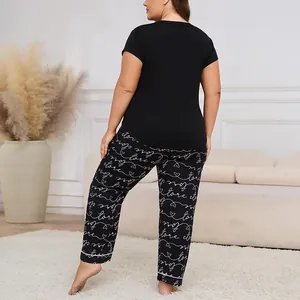 Plus size women's two-piece pajama set with short sleeve top and heart print pants