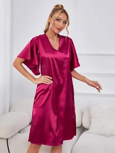 Full view of a fuchsia satin nightgown featuring elegant flutter sleeves and a V-neckline
