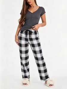 Comfortable women's plaid pajama set with short sleeve V-neck top and checkered pants