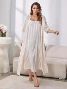 Elegant two-piece satin pajama set featuring a striped slip dress and matching long robe